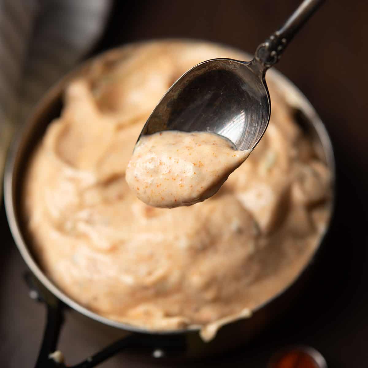 chili aioli in a spoon to serve as a dipping sauce.