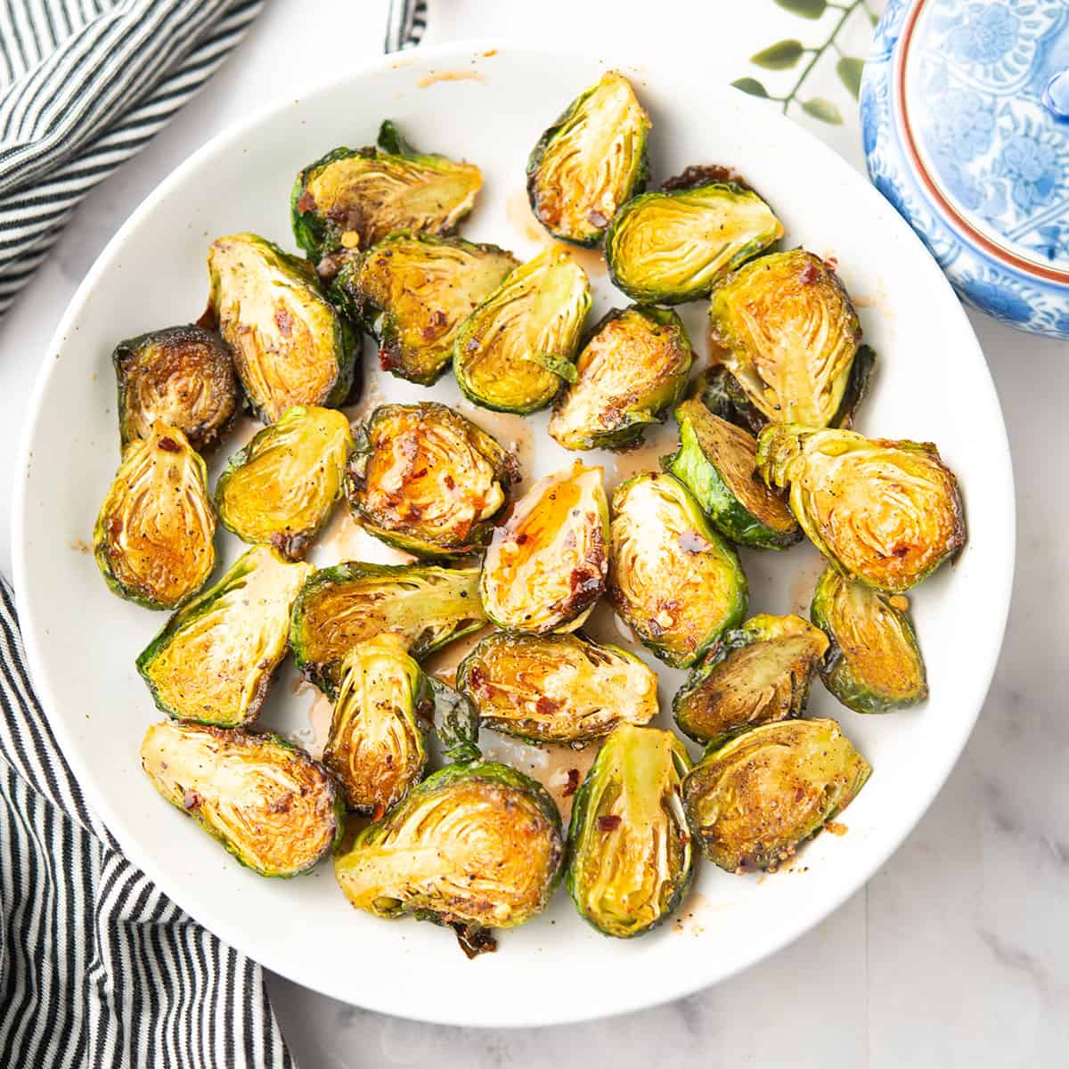 hot honey Brussels Sprout, are in a plate, ready to enjoy