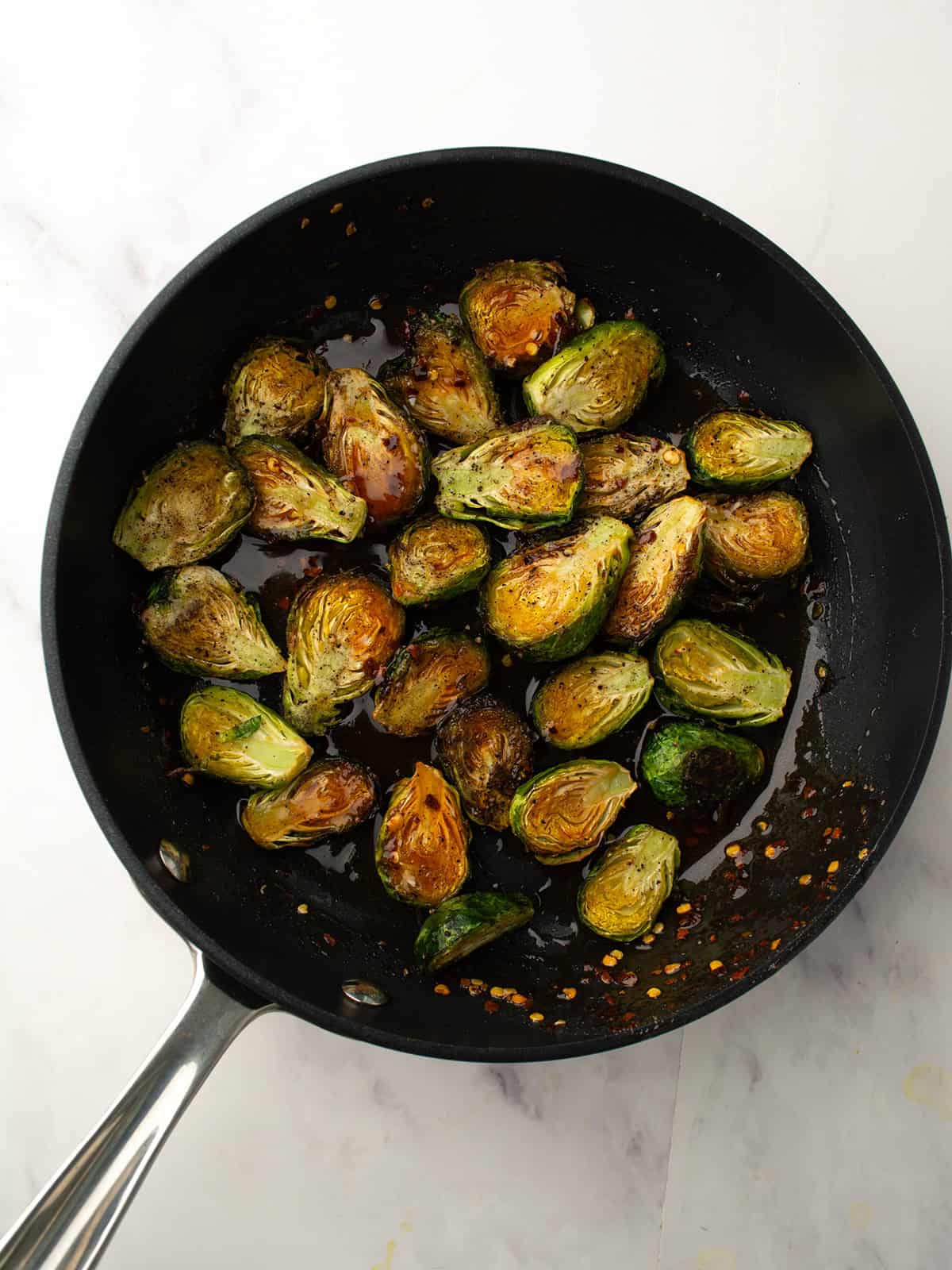 brussles sprouts tossed into the sauce