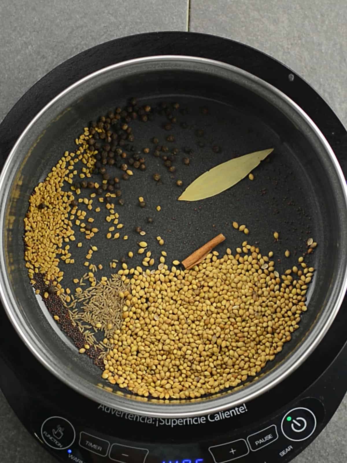the spices are added to the pan