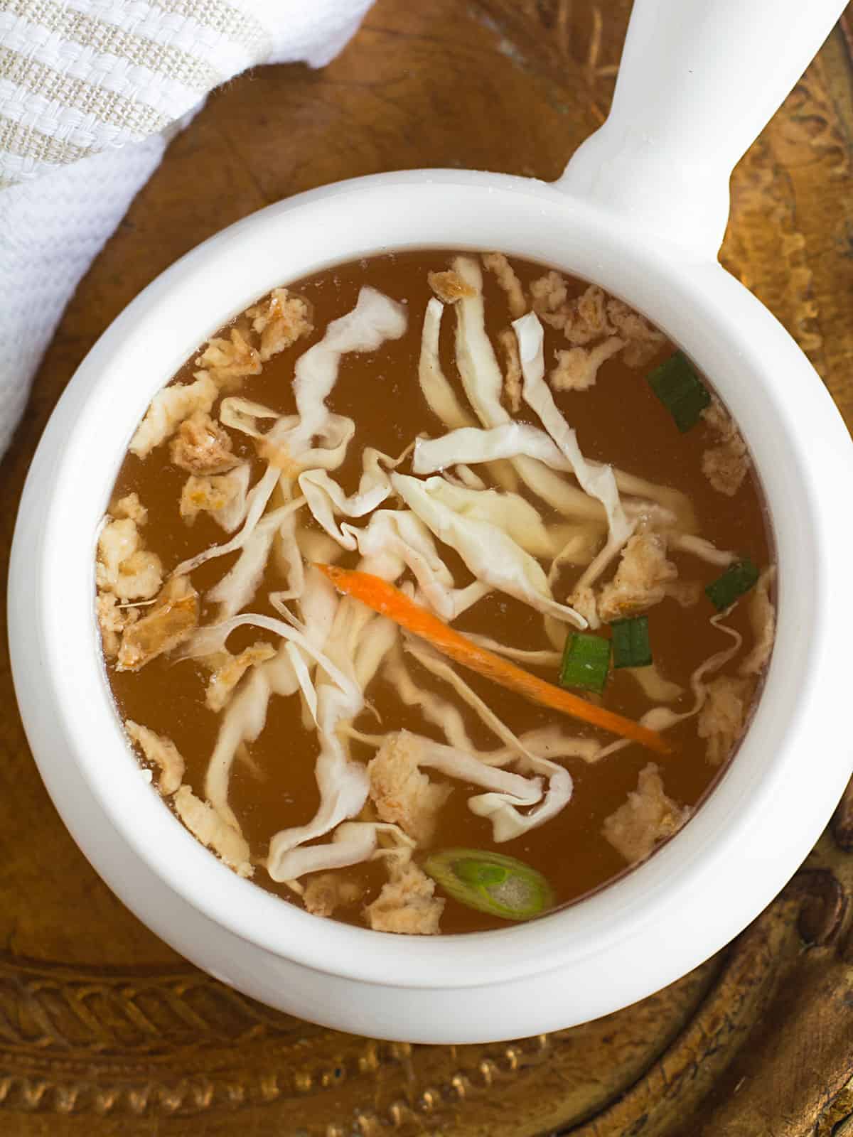 Bowl of homemade Hibachi soup with fresh vegetables.