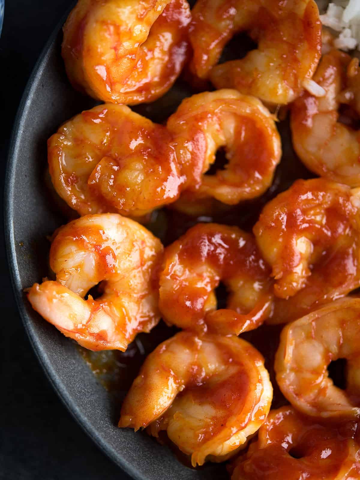 Delicious Honey Sriracha Shrimp served in a bowl.
