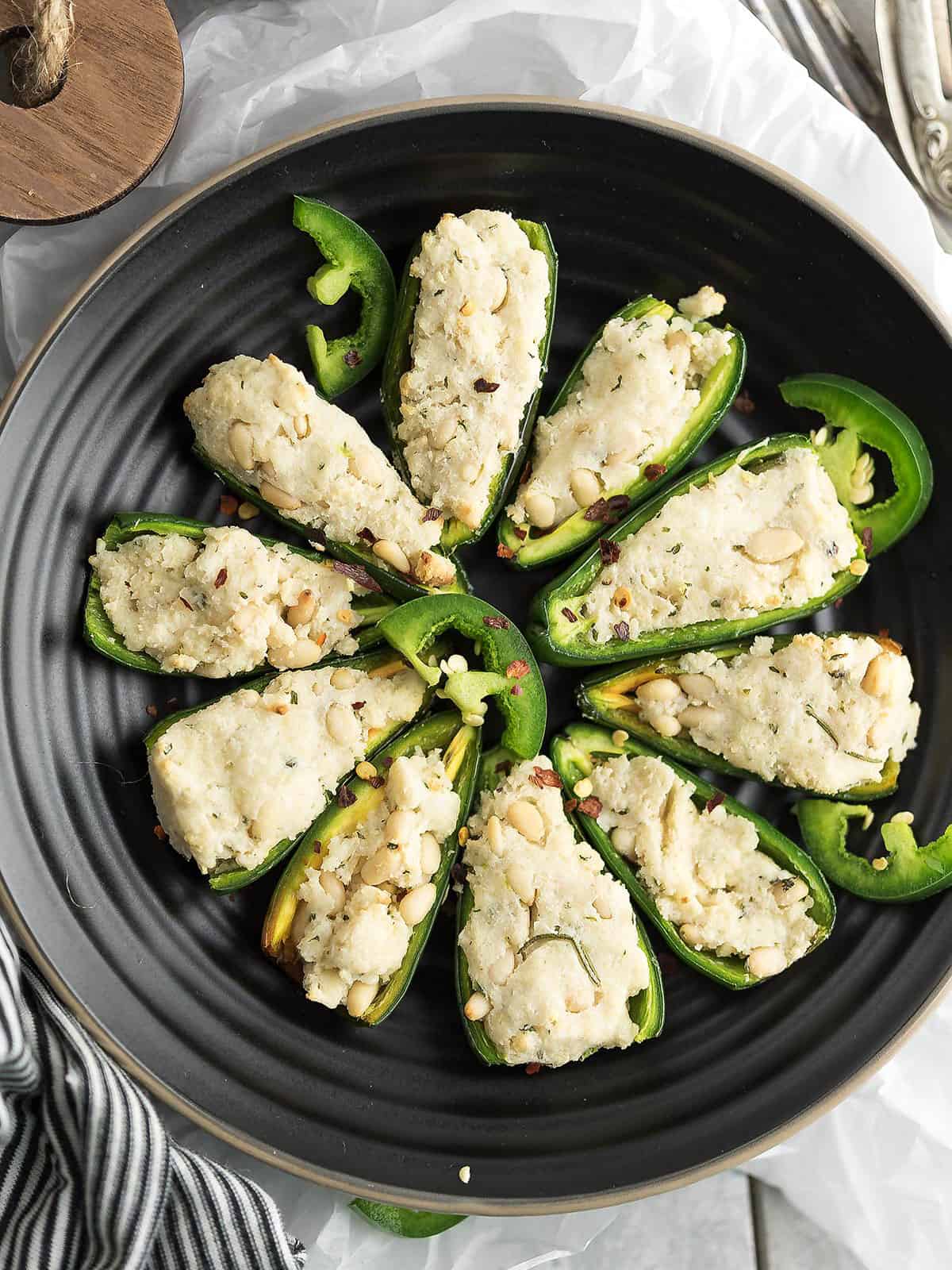 Delicious jalapeno poppers without cream cheese on a plate.