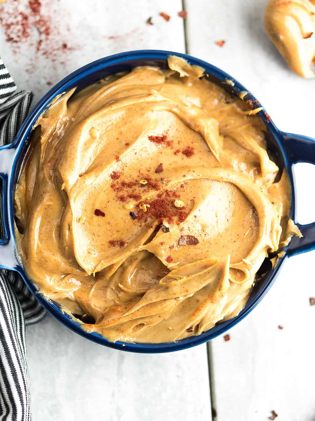 spicy peanut butter in a bowl ready for dipping.