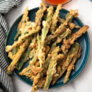 texas toothpick is coated with a flavorful batter and served with a dipping sauce