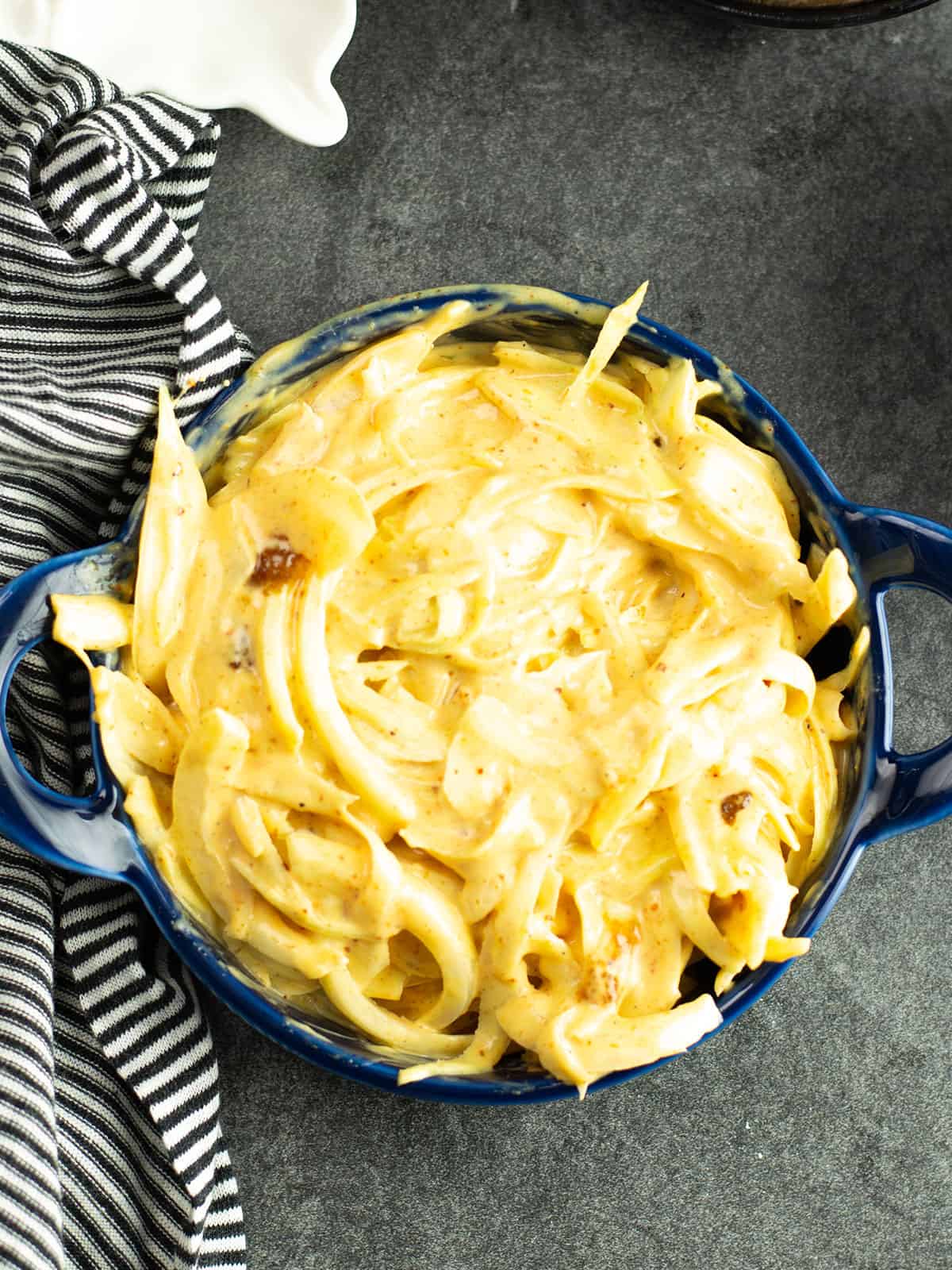 cajun coleslaw served in a blue bowl