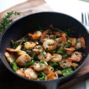 garlic pepper shrimp(trinidad style) served in a cast iron skillet.