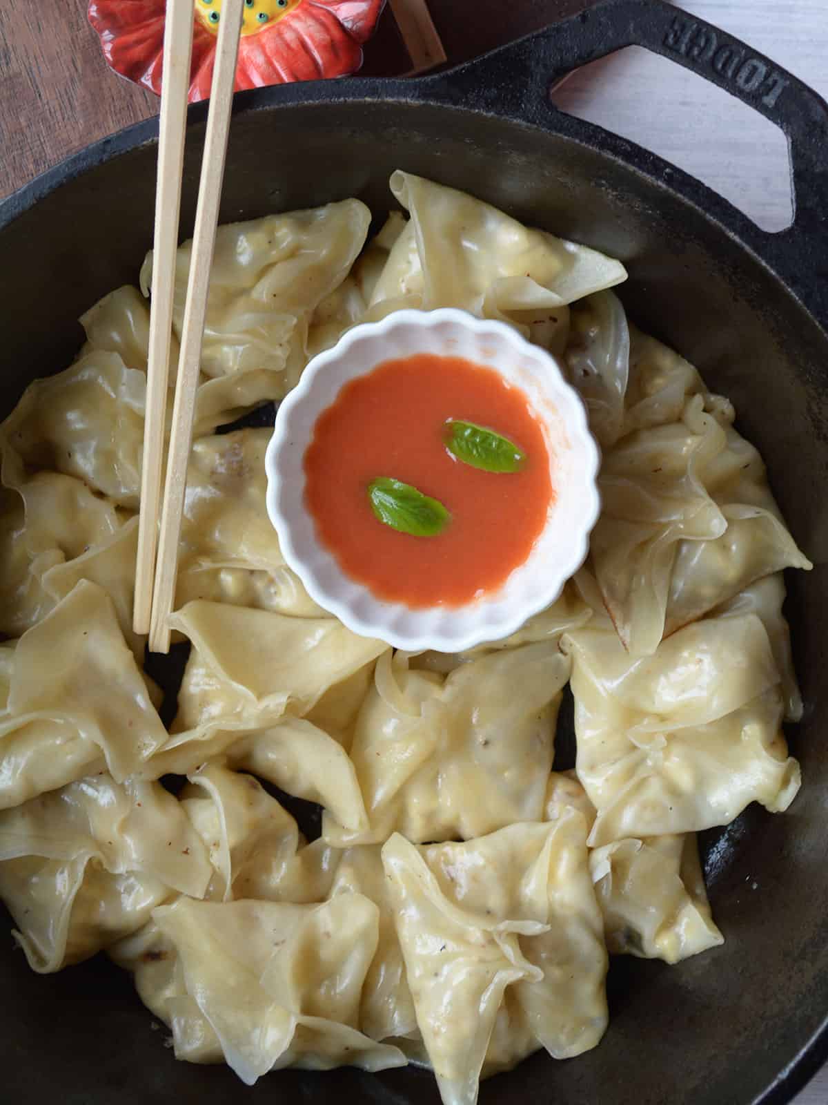 pan fried wontons served with spicy dipping sauce.