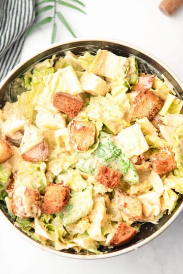 spicy Caesar salad tossed in a homemade spicy salad dressing with jalapeno and crushed red peppers.