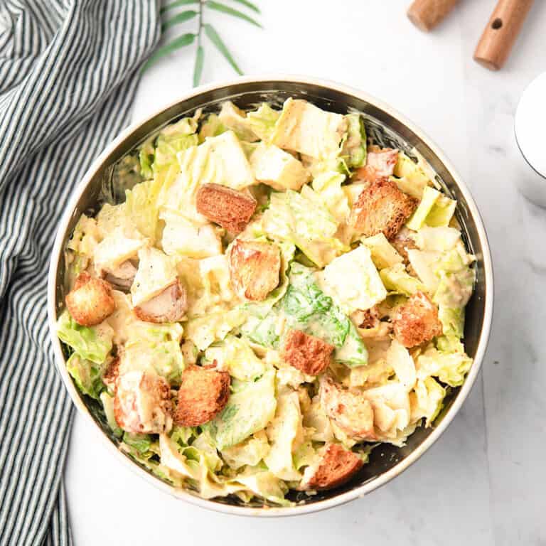 spicy Caesar salad tossed in a homemade spicy salad dressing with jalapeno and crushed red peppers.