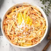 spicy kani salad served in a bowl with fork.
