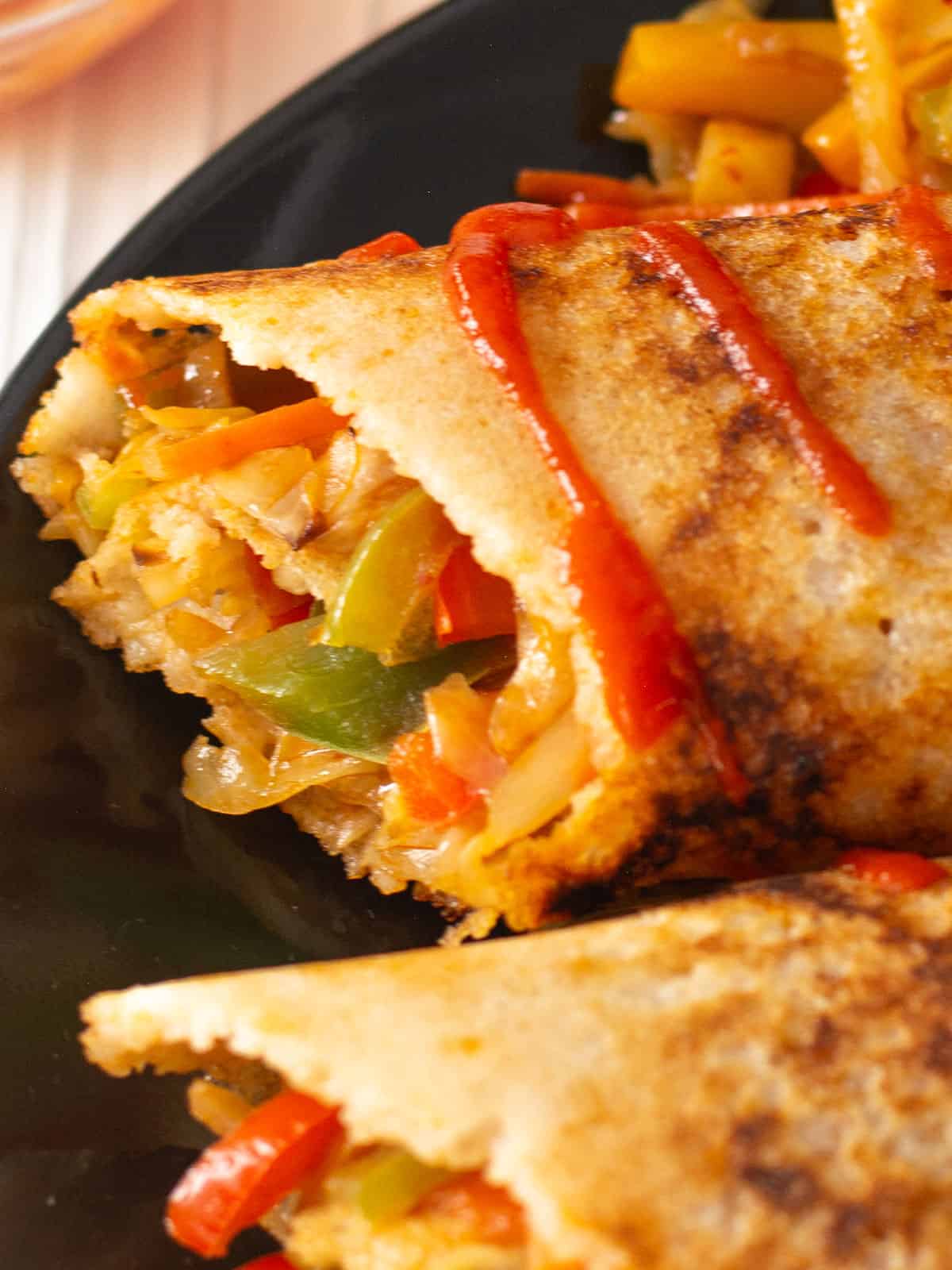Chinese-inspired crispy vegetables are stuffed inside the dosa