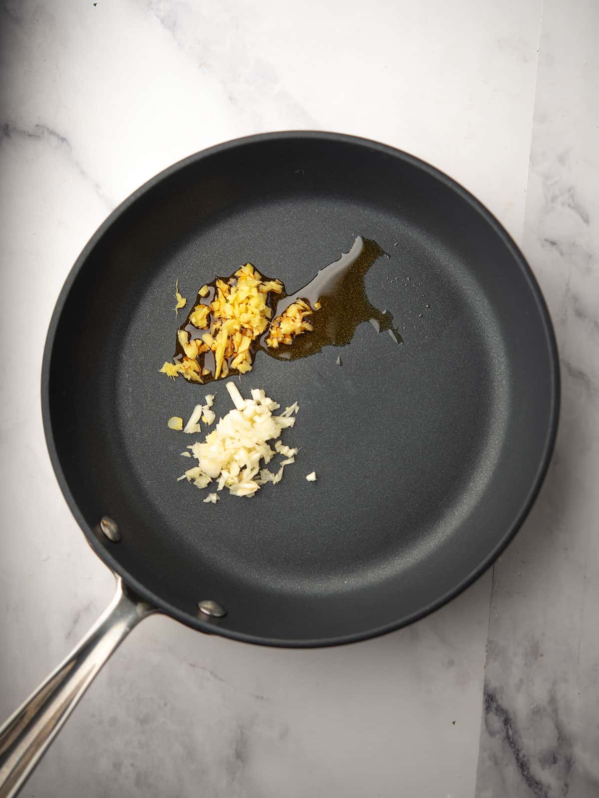 sauteing ginger, garlic in chili oil.