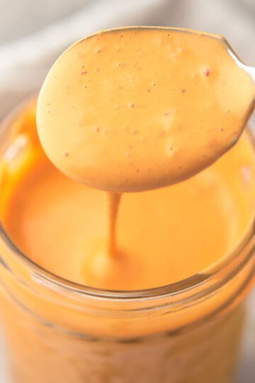 creamy, flavorful chipotle lime sauce in a spoon