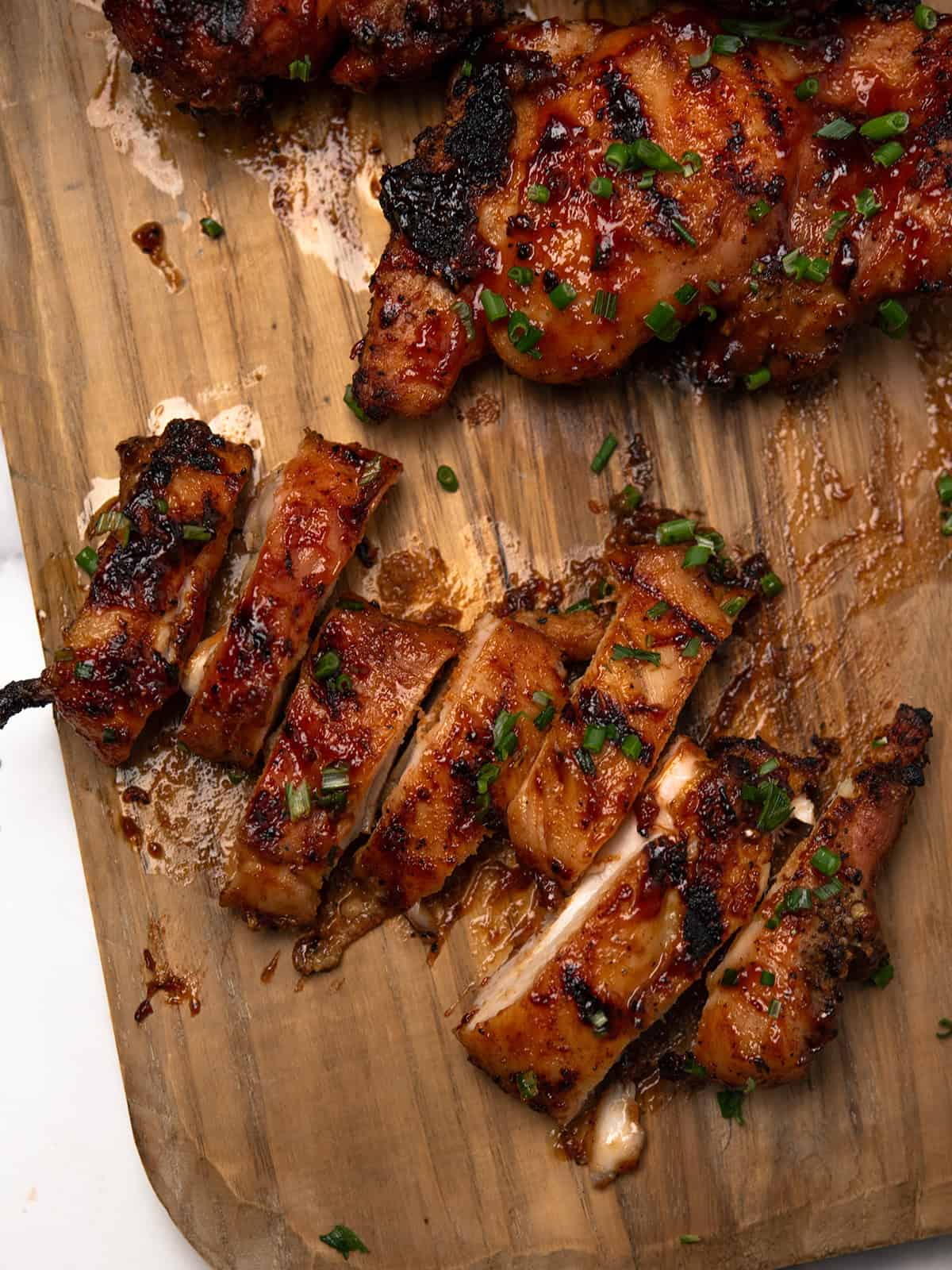 Juicy BBQ boneless chicken thighs with grill marks: with grill pan that's baked in the oven