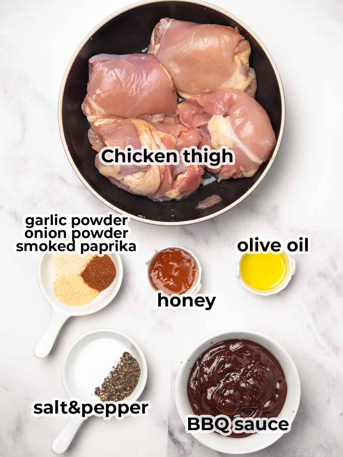 Ingredients for making BBQ boneless chicken thighs assembled in the kitchen counter