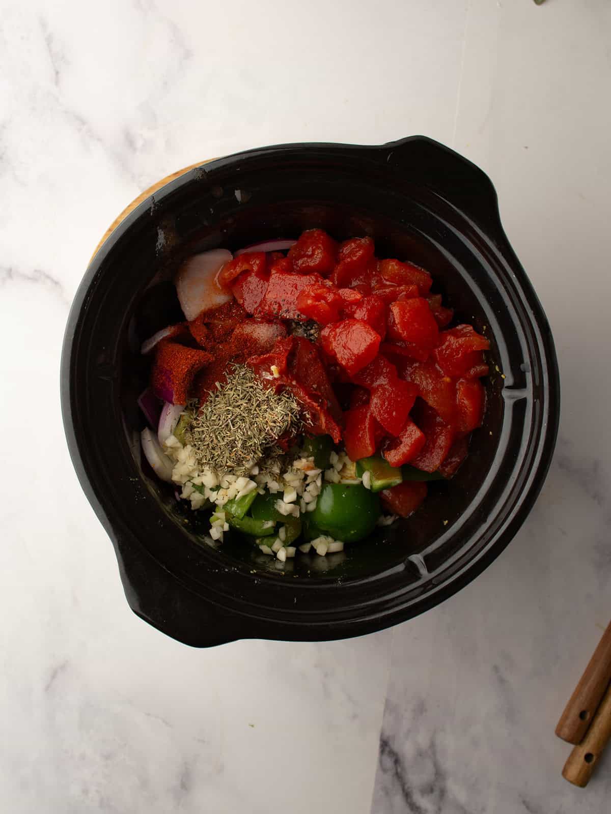 all the ingredients added to the slow cooker