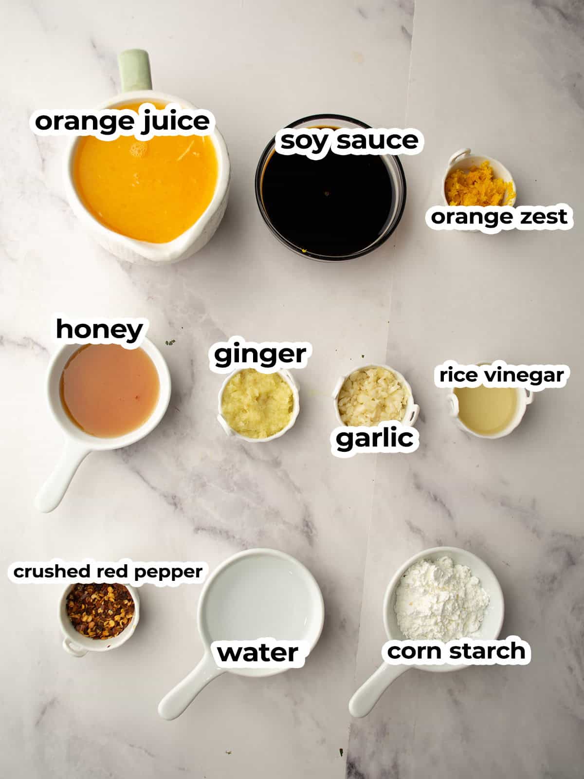 ingredients for the orange ginger sauce assembled in the kitchen counter