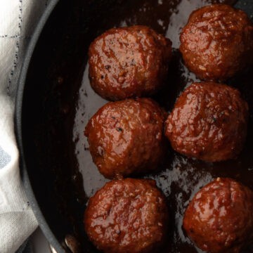Delicious Pineapple BBQ Sauce drizzled over meatballs