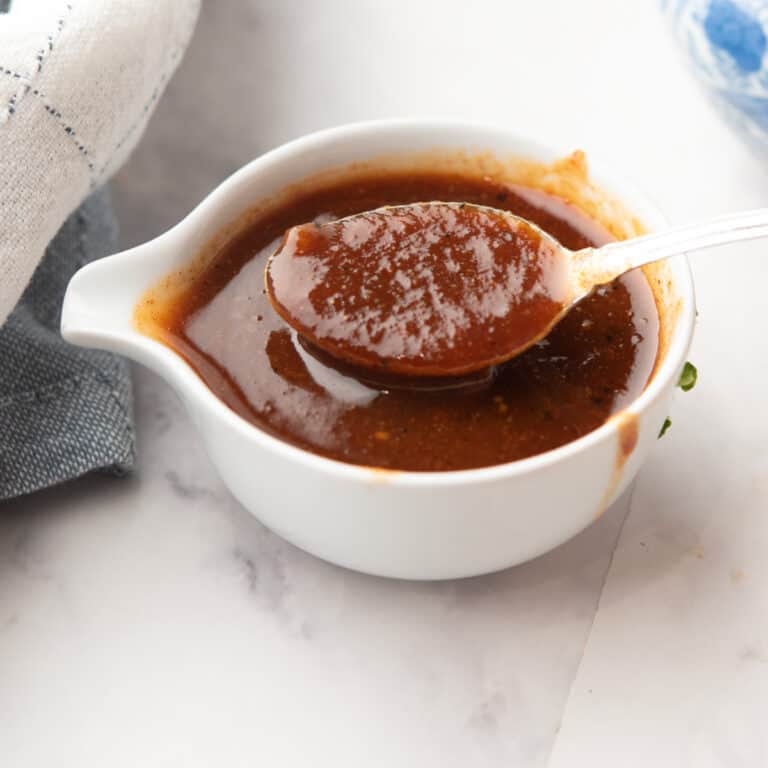 pineapple bbq sauce in a pan with a spoon