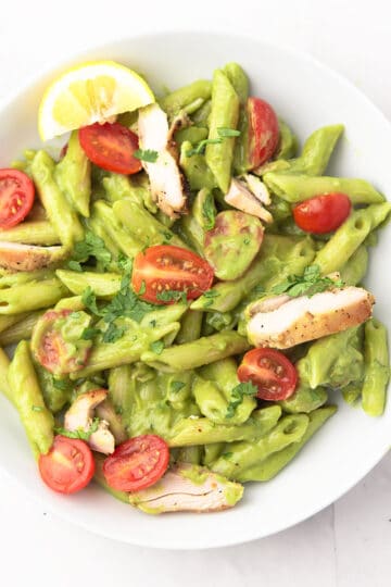 Bowl of avocado chicken pasta ready to serve