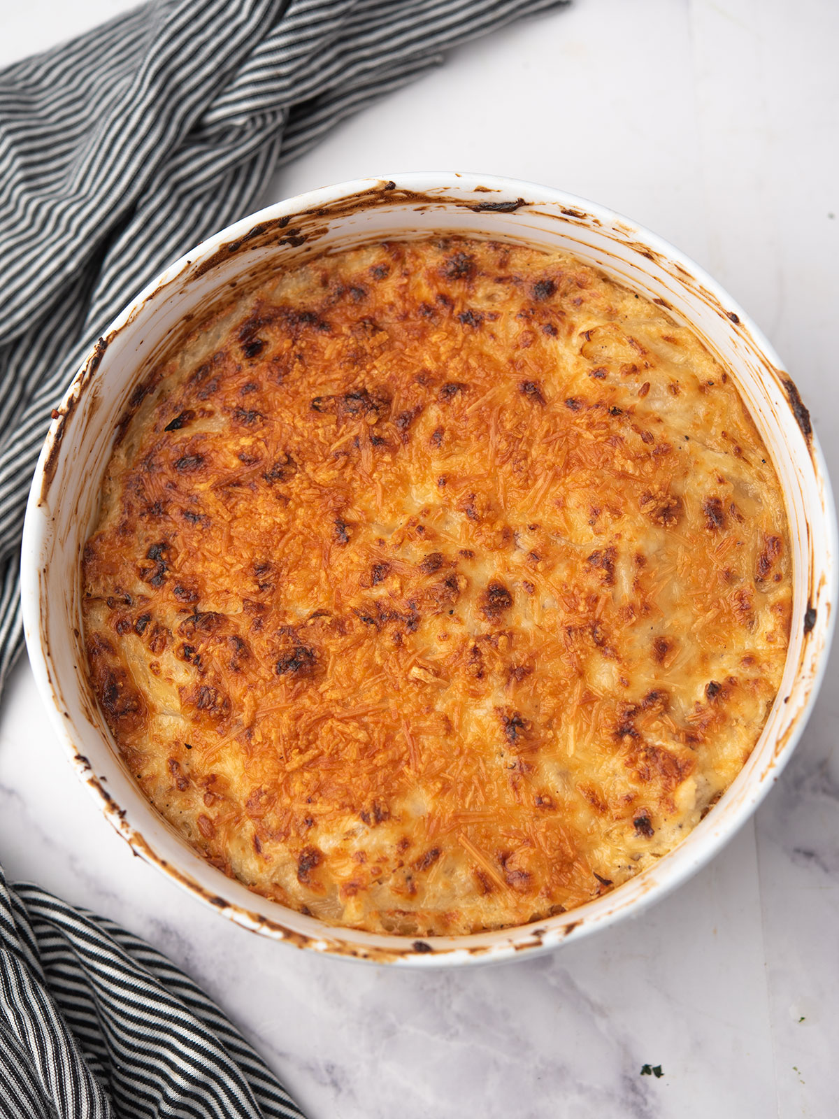 Delicious hot onion dip topped with golden crust.