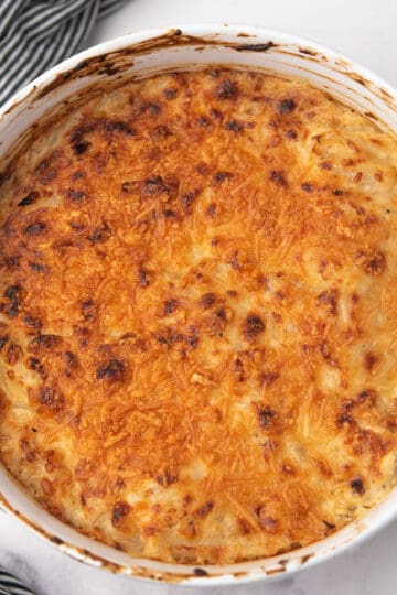 hot onion dip creamy, and with golden crust, dipping ready to serve for the party