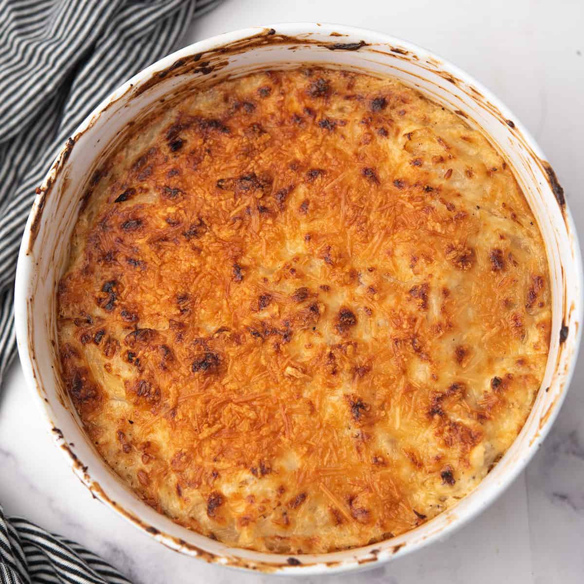 hot onion dip creamy, and with golden crust, dipping ready to serve for the party