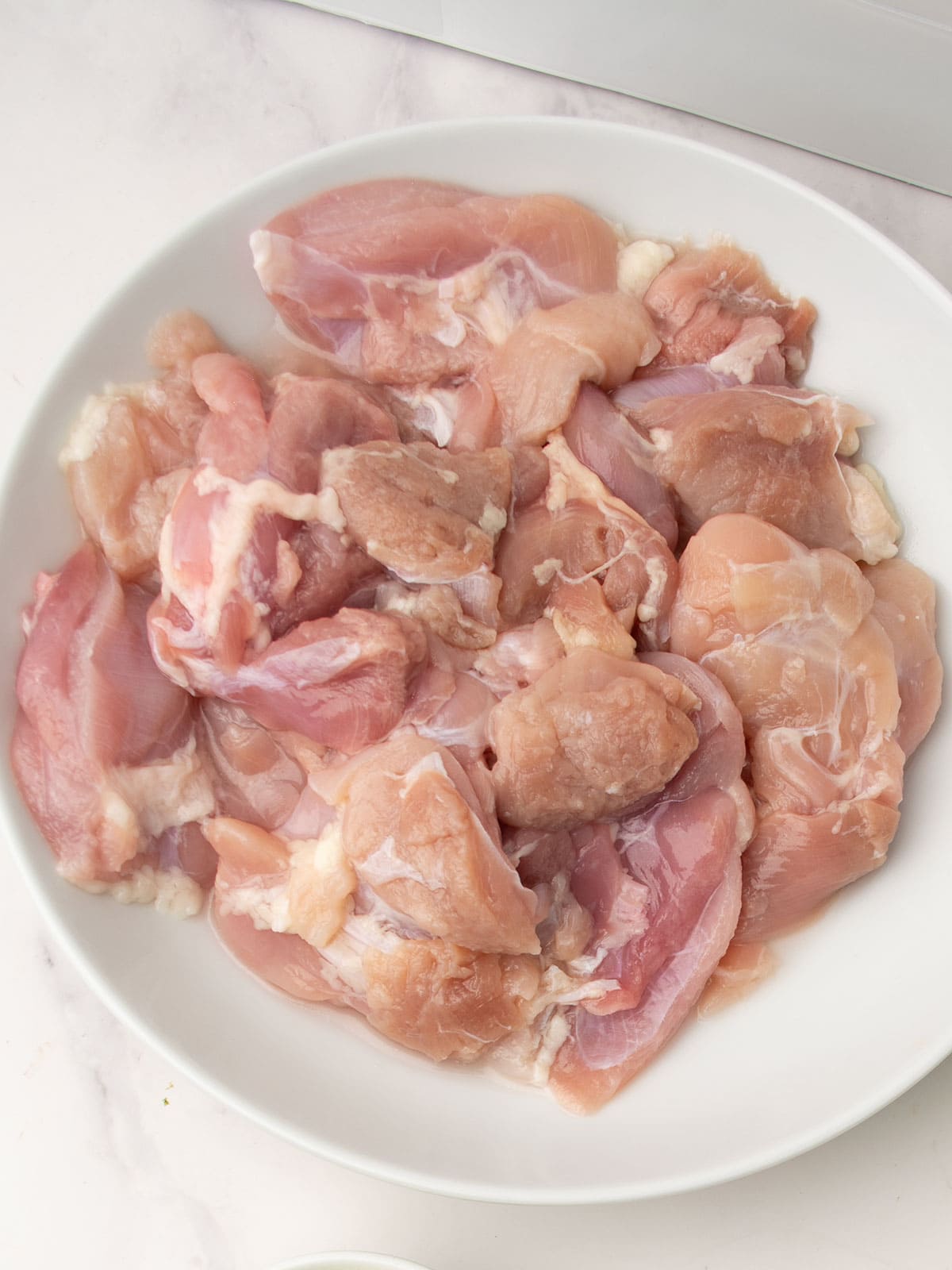cut chicken into cubes
