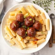 pineapple barbeque meatballs served in over pasta for the weeknight dinner