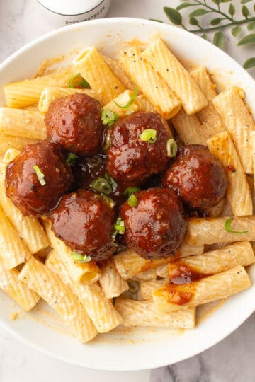 pineapple barbeque meatballs served in over pasta for the weeknight dinner