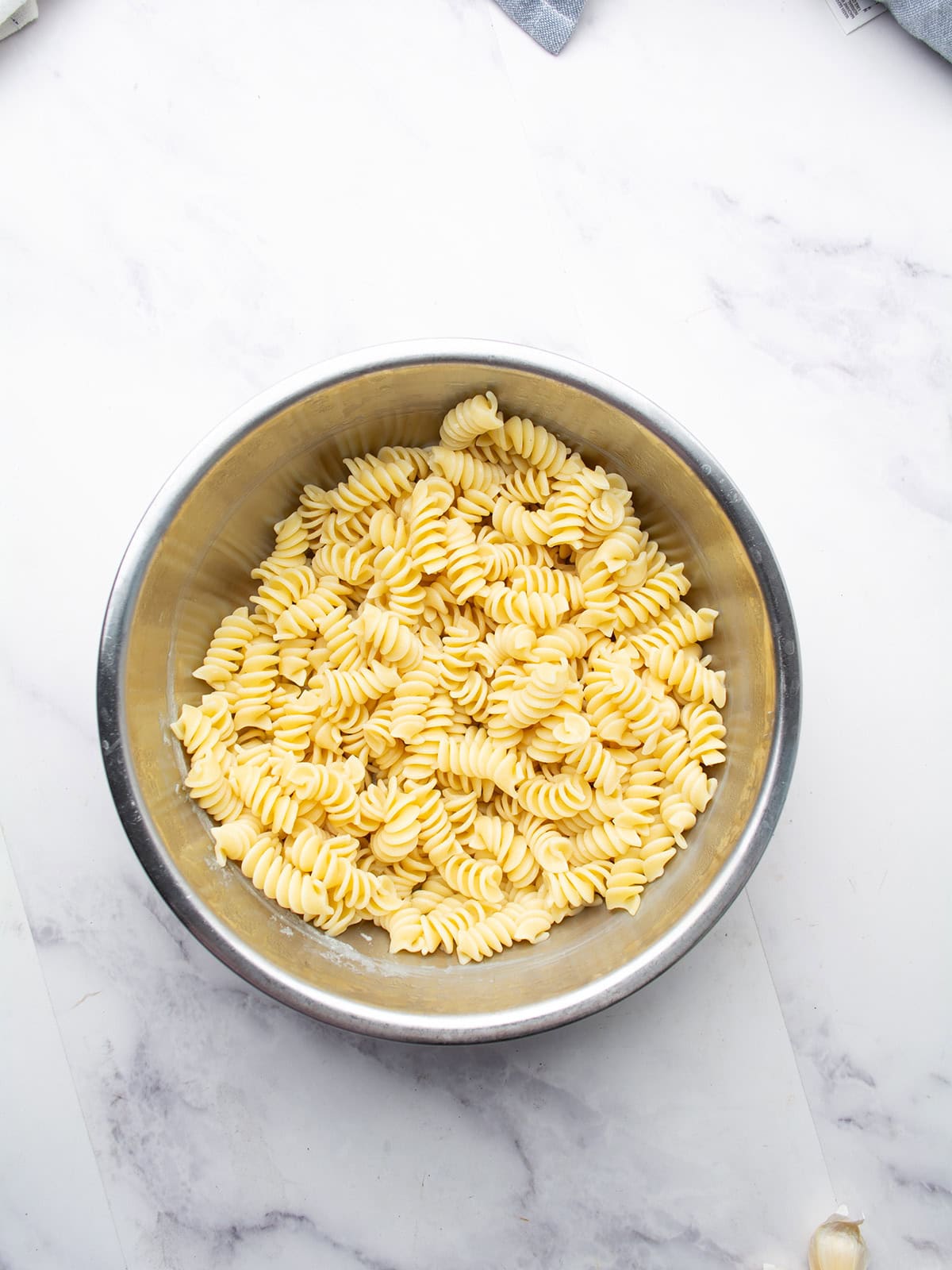 Cooking pasta in a pot of boiling salted water.