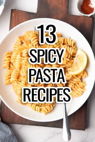 spicy pasta recipes text overly over a bowl of pasta