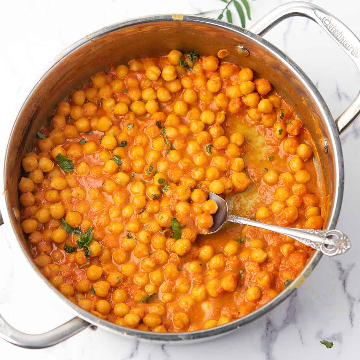 chickpea curry without coconut milk garnished with cilantro