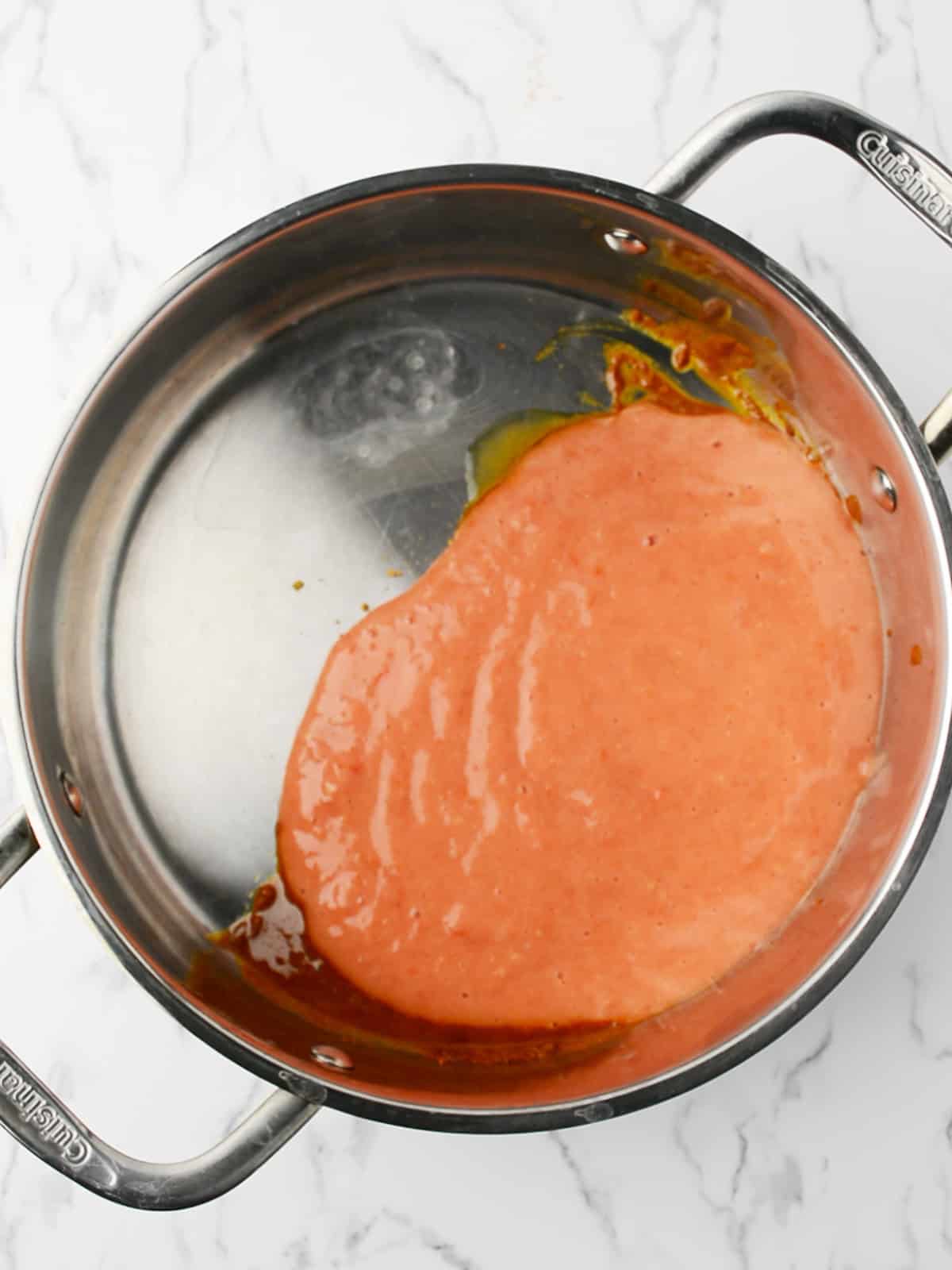 crushed tomato added to the curry mixture
