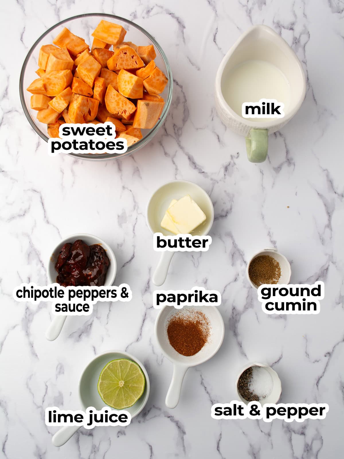 the ingredients for making spicy mashed sweet potatoes arranged in the kitchen counter