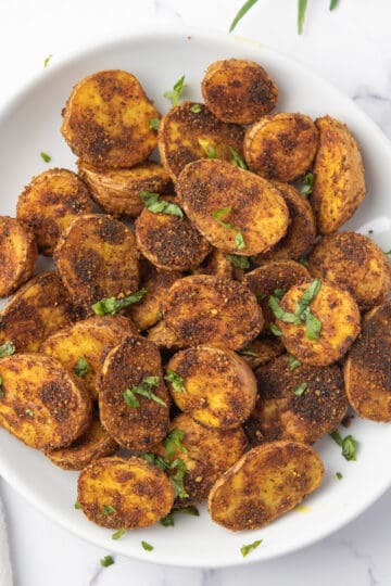 spicy roasted potatoes with oven in a plate
