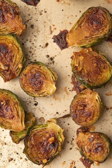 Roasted brussels sprouts with sweet potatoes, roasted in the sheet pan.