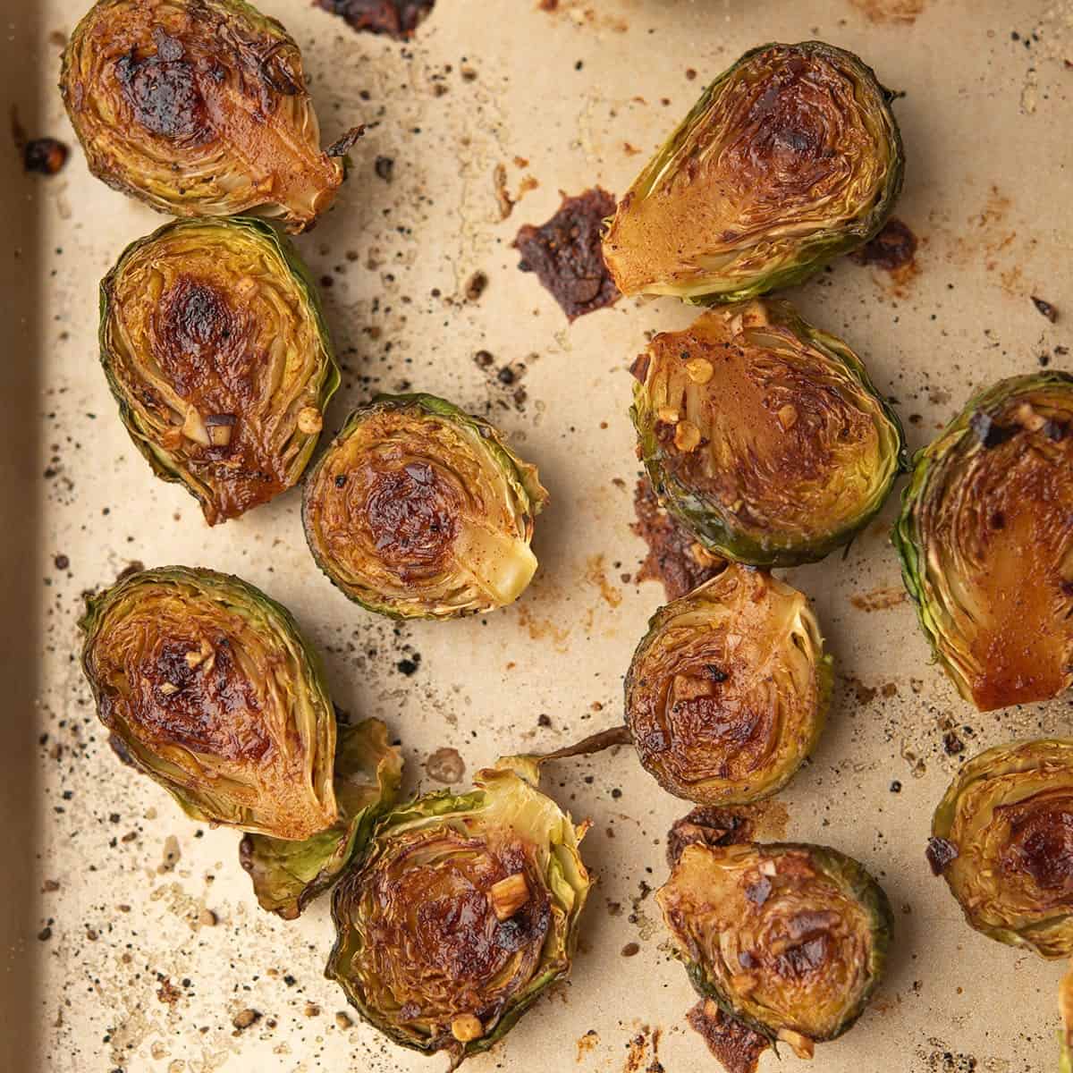 Roasted brussels sprouts with sweet potatoes, roasted in the sheet pan.