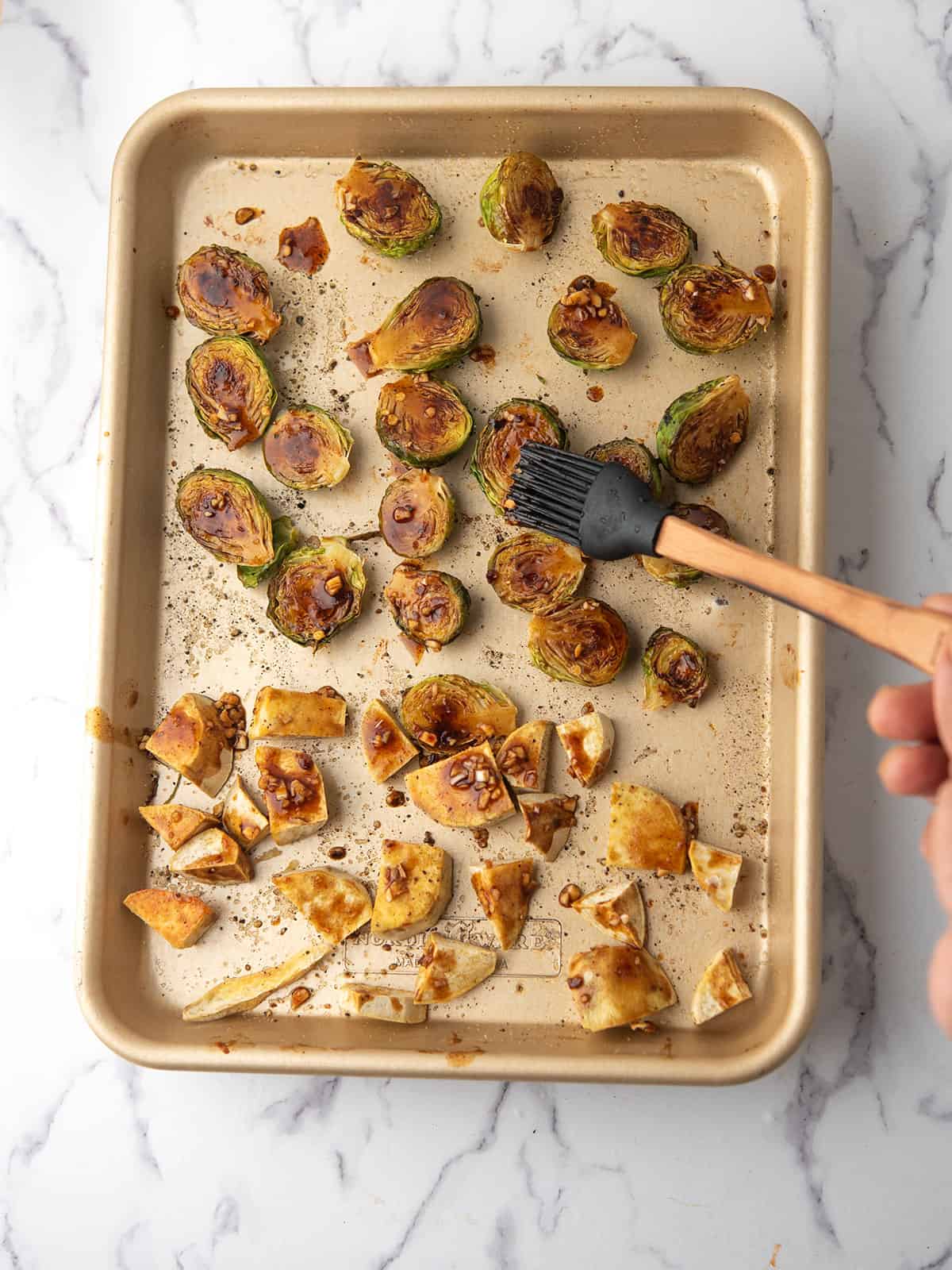 the sweet and spicy glaze drizzled over the Roasted brussels sprouts with sweet potatoes