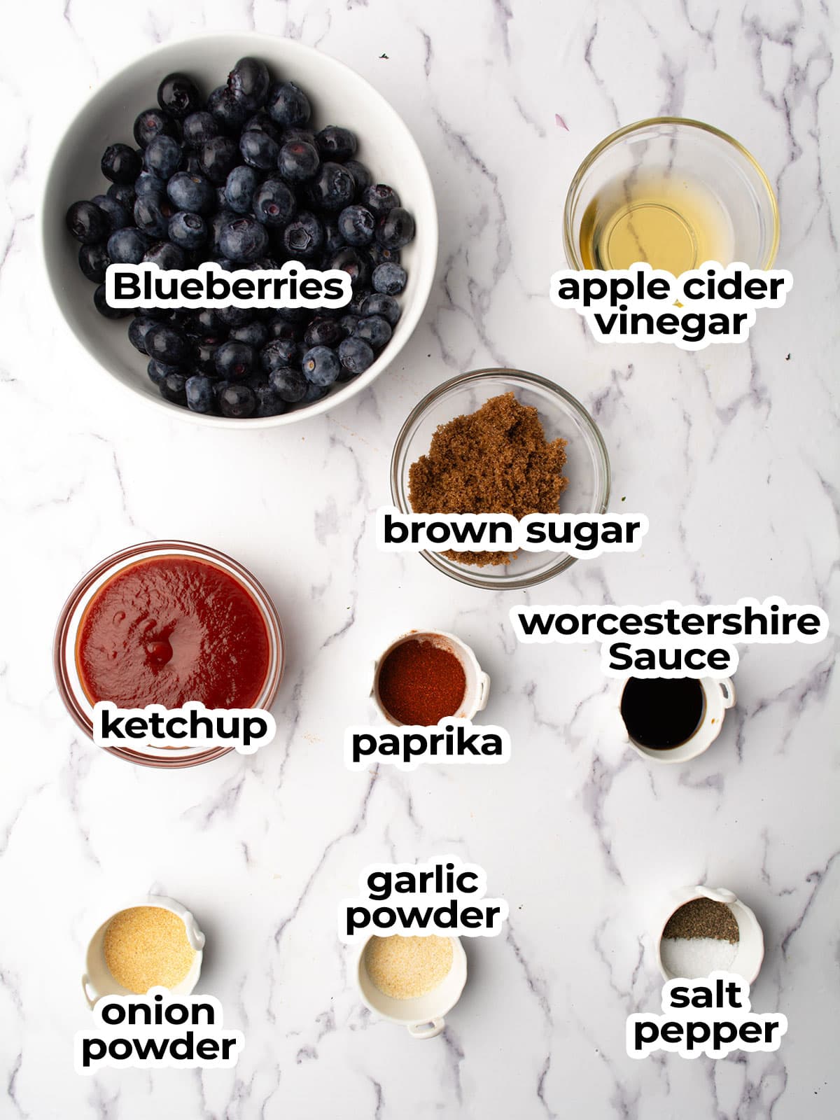 ingredients for making blueberry bbq jar assembled in the kitchen counter.