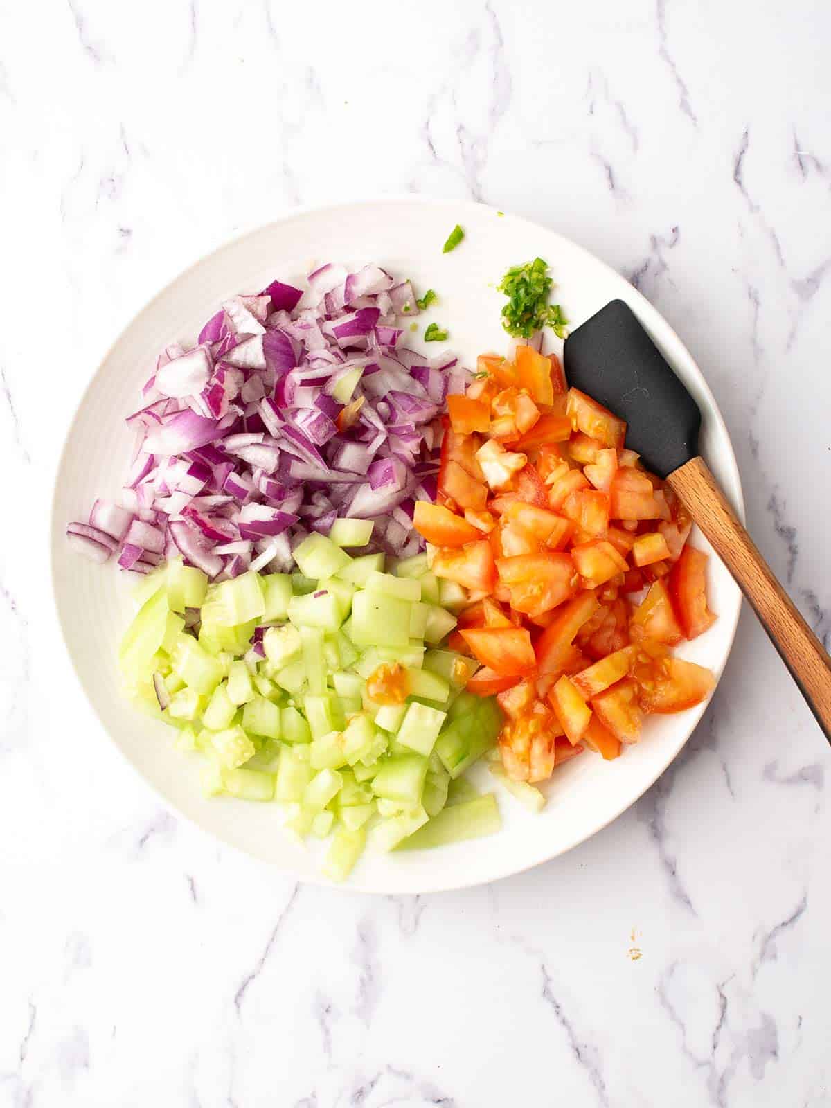 all the chopped veggies in the plate.