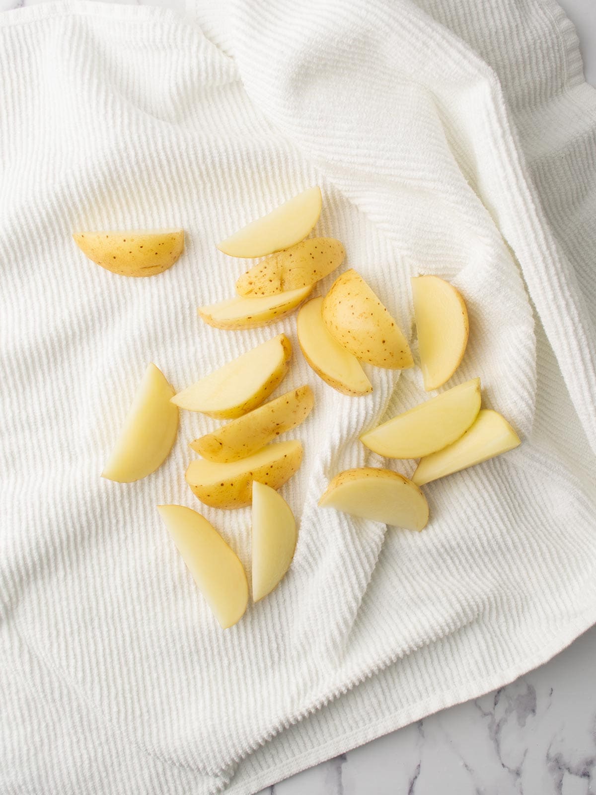 potatoes are pat dry with kitchen towel.