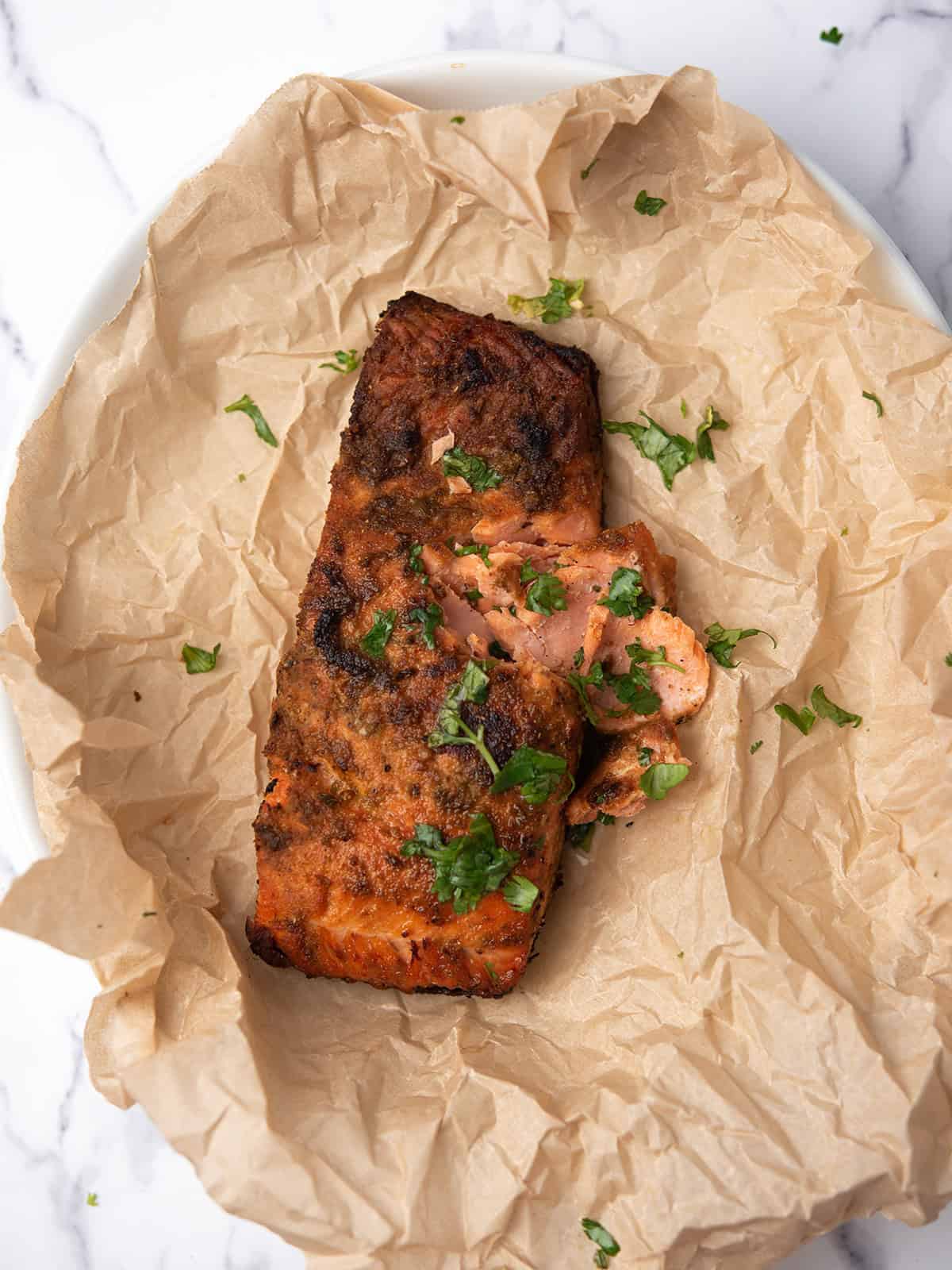 Baked blackened salmon fillets with crispy crust and juicy inside