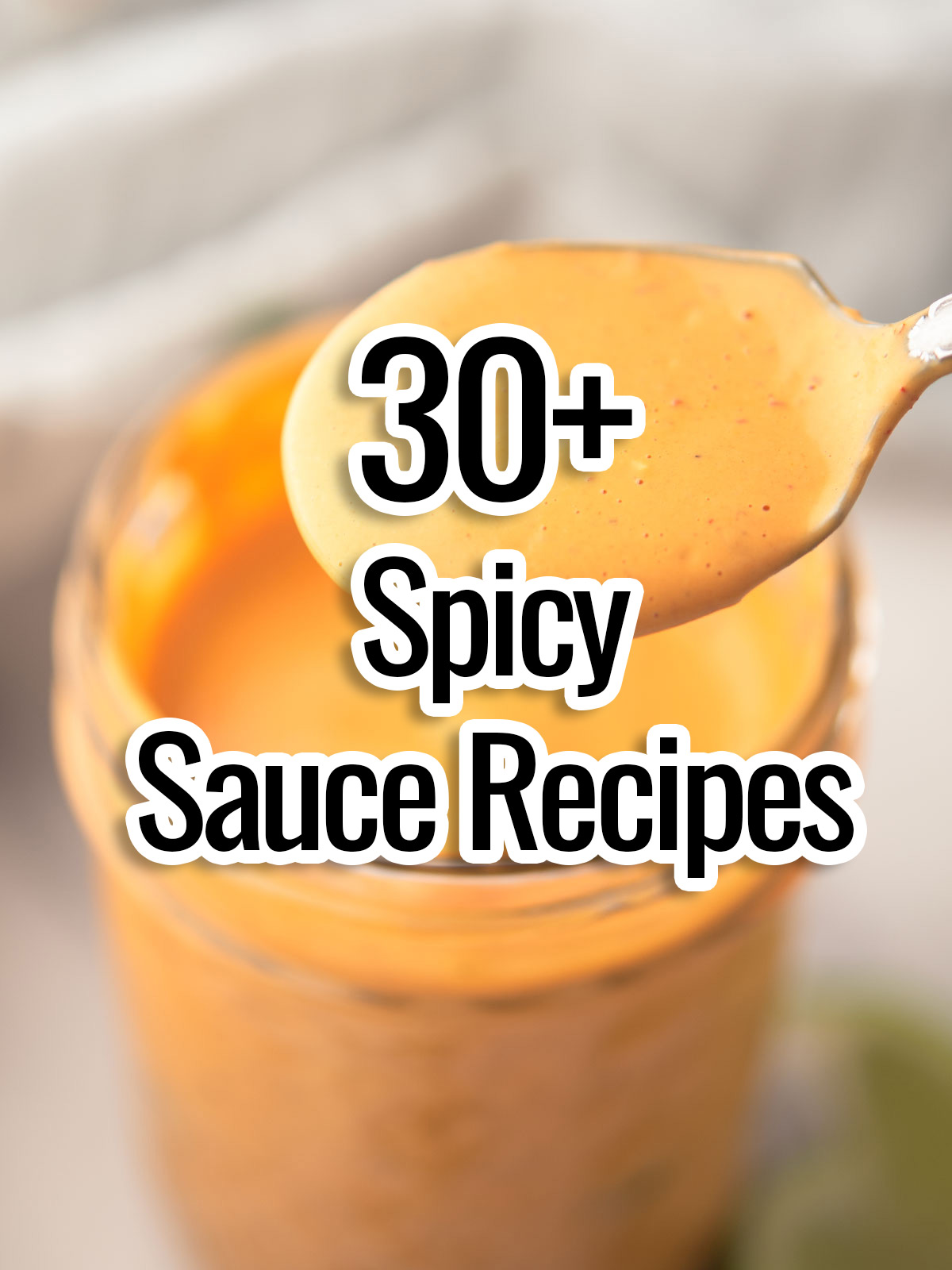 the text 'spicy sauces recipes' placed over the bowl of sauce