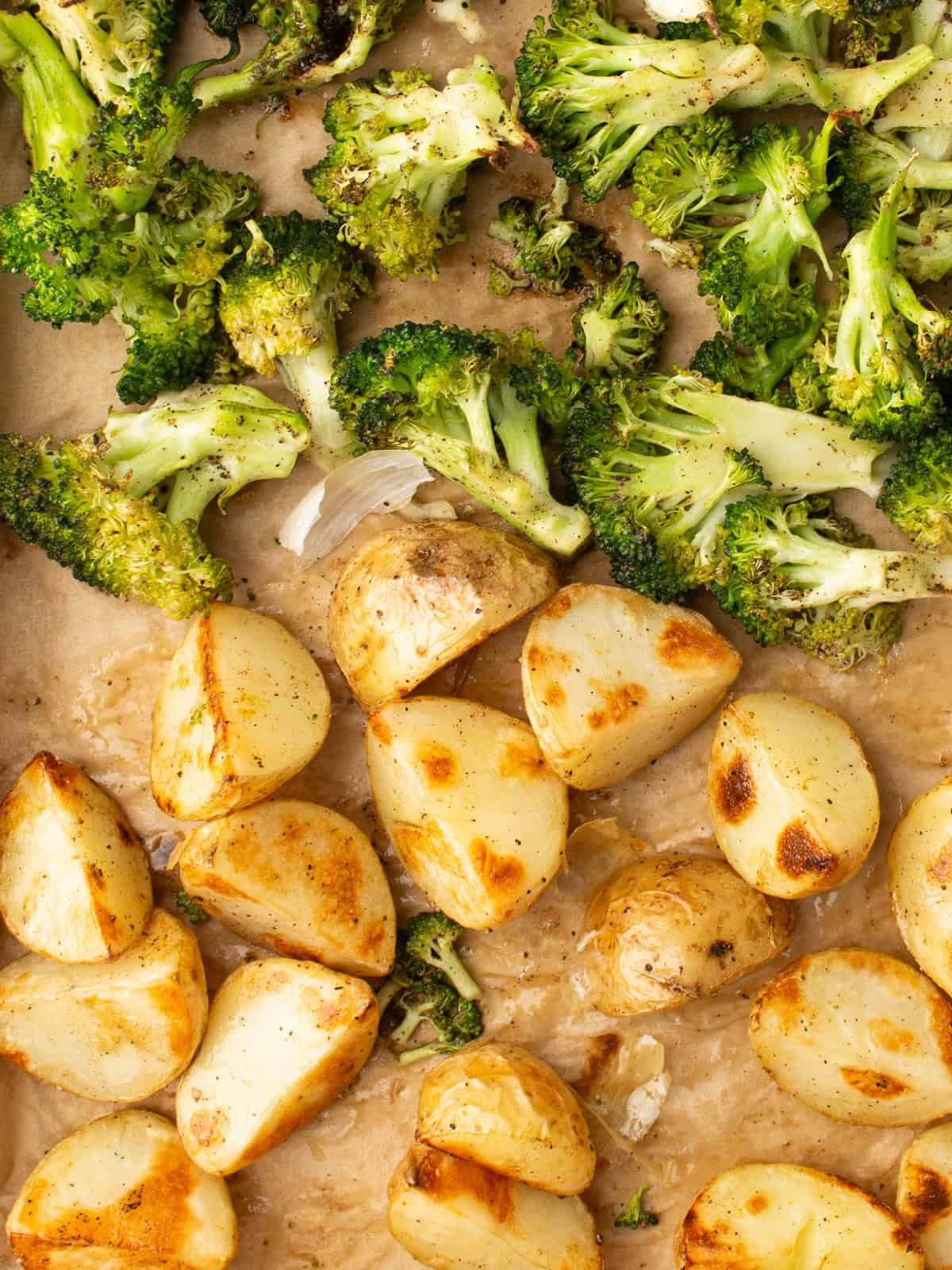crispy oven roasted broccoli and potatoes in the sheet pan