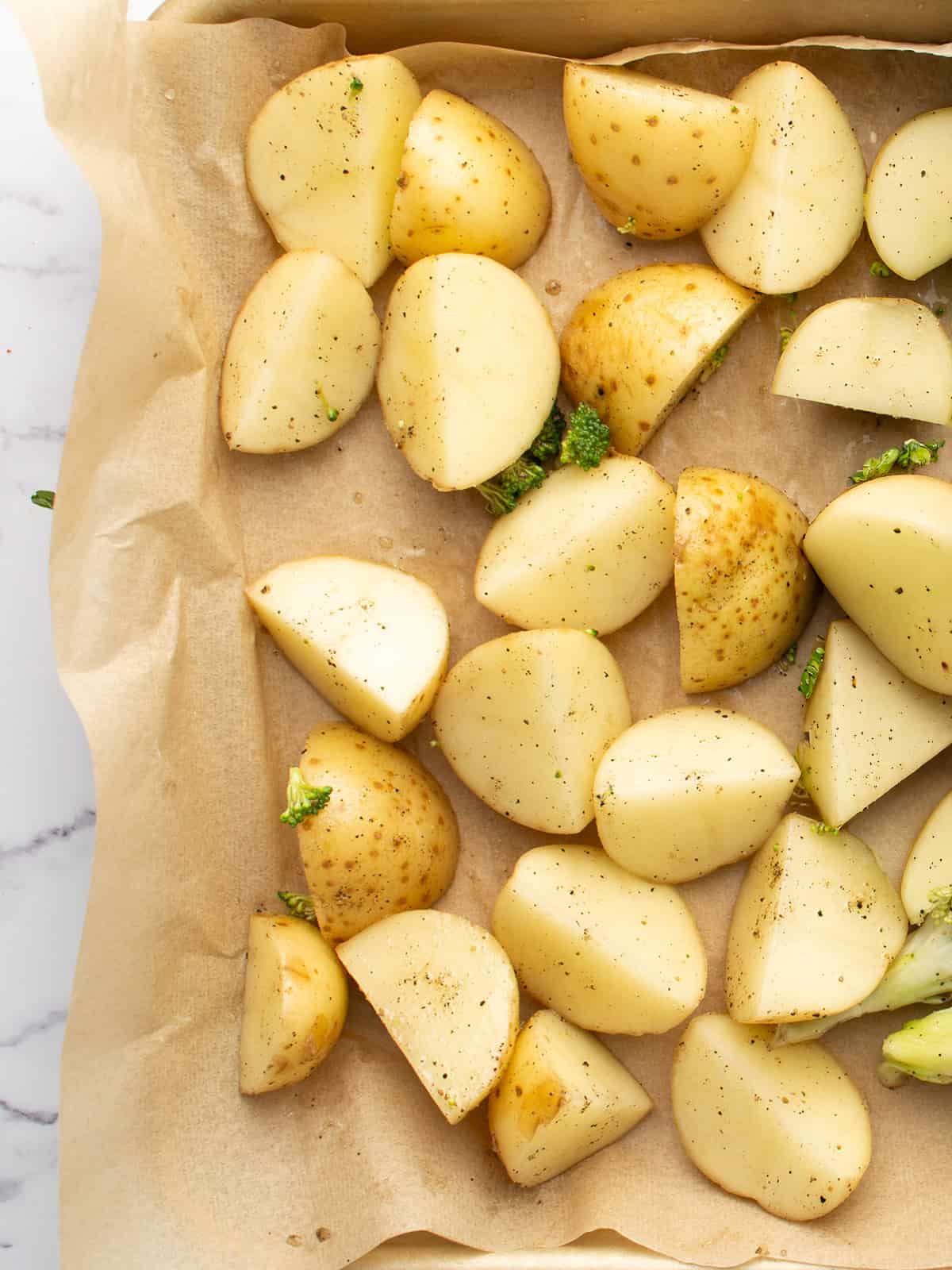 well seasoned potatotes ready to roast
