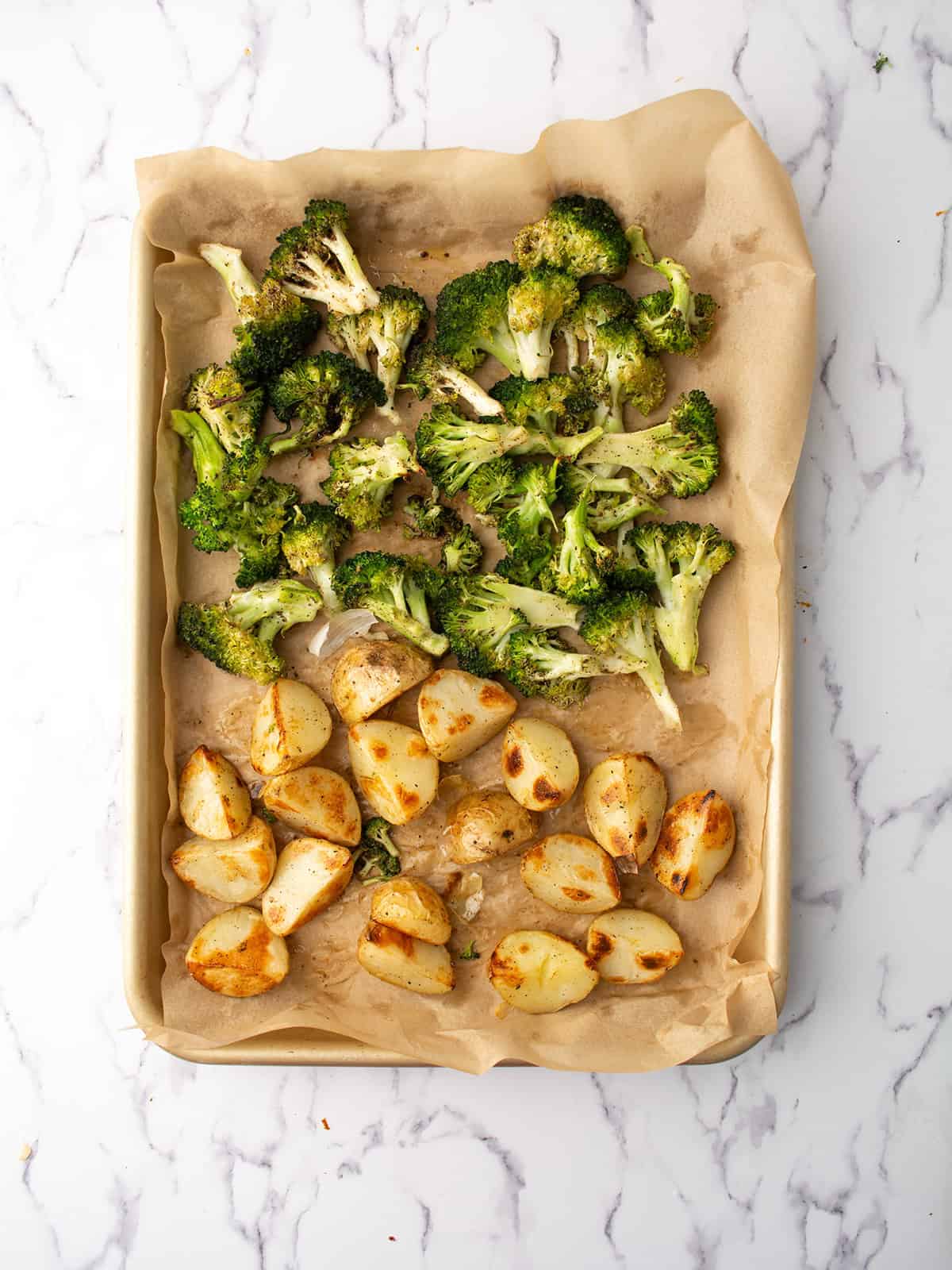 steaming roasted broccoli and potatoes just from the oven