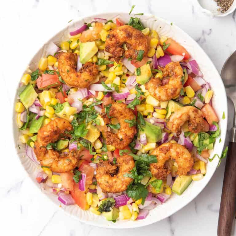 corn and shirmp salad, with tomato, avocado, red onion, ready to enjoy for this summer weeknight dinner.