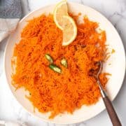 indian carrot salad served as the side dish over the dinner table.